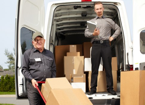 Moving van and packed boxes for local removals in Bickley