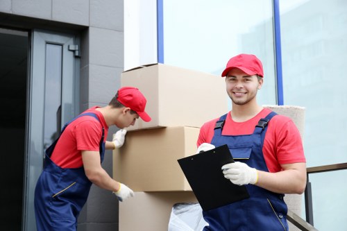 Professional movers loading furniture for a Bickley relocation